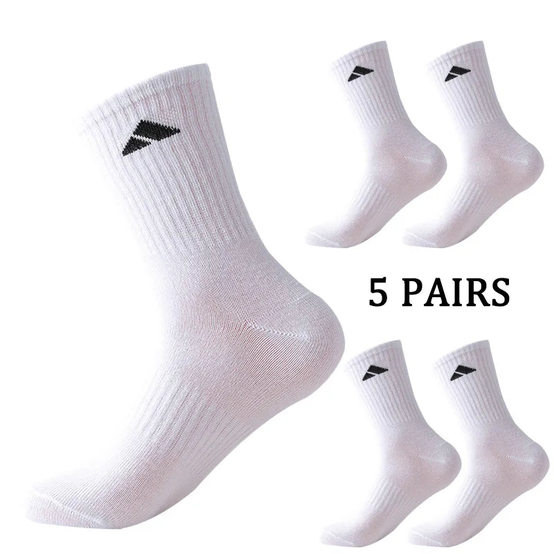 5 pairs of black and white patterned mid length socks suitable for both men and women comfortable and unisex sports socks